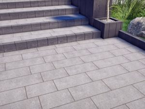 Polbruk_Triada NOWOŚĆ Jak zaprojektować aranżację strefy wejściowej w stylu nowoczesnym? Minimalistyczne, o prostych bryłach, z dużymi powierzchniami przeszklonymi na elewacji – tak prezentuje się większość domów zbudowanych w stylu nowoczesnym